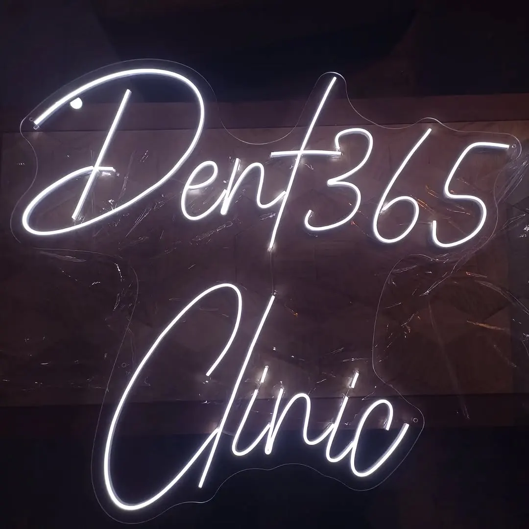 Diş kliniği için beyaz el yazısı logo neonu