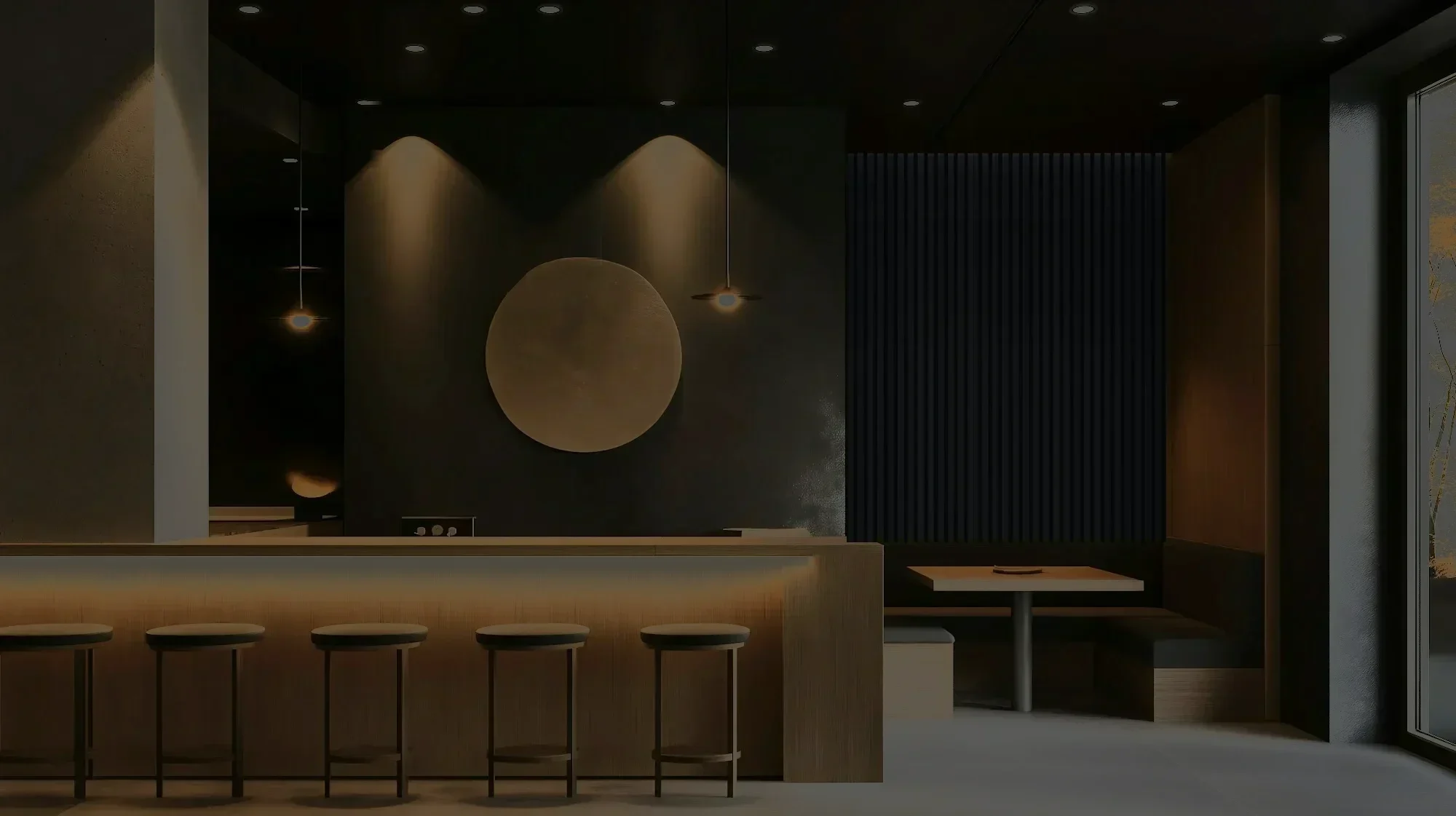 Dark cafe interior with a bar counter and wooden slatted wall